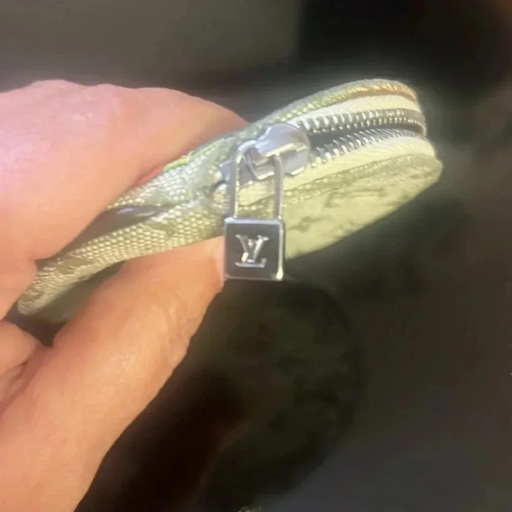 Louis Vuitton mini Lin monogram Conta De Fis coin pouch COA included